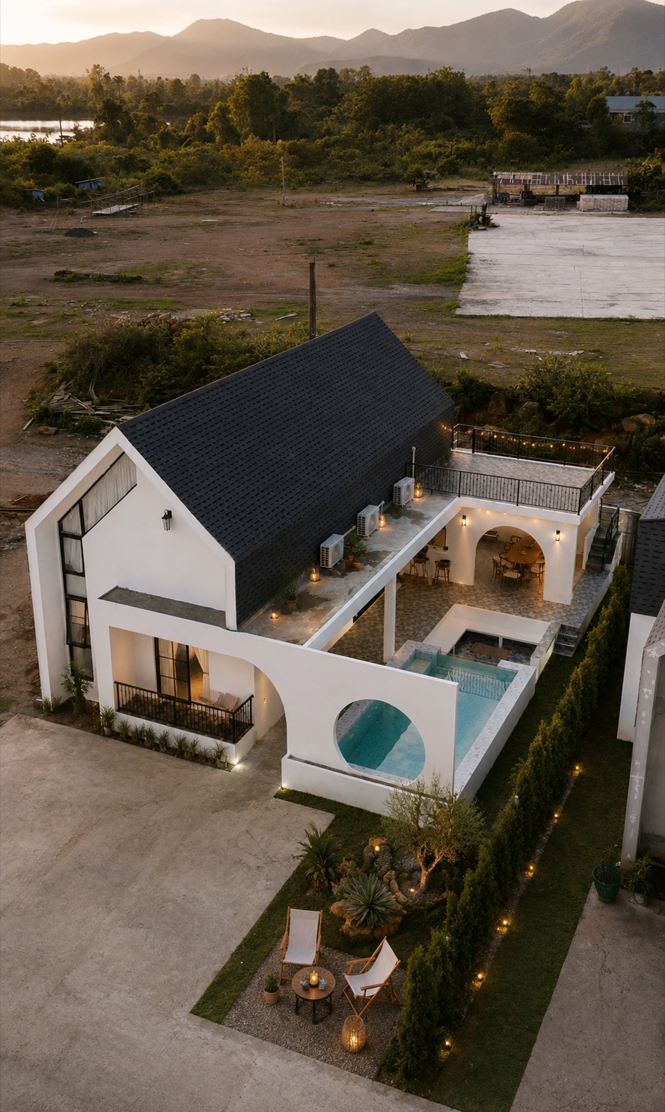 Phaview pool villa exterior at dusk