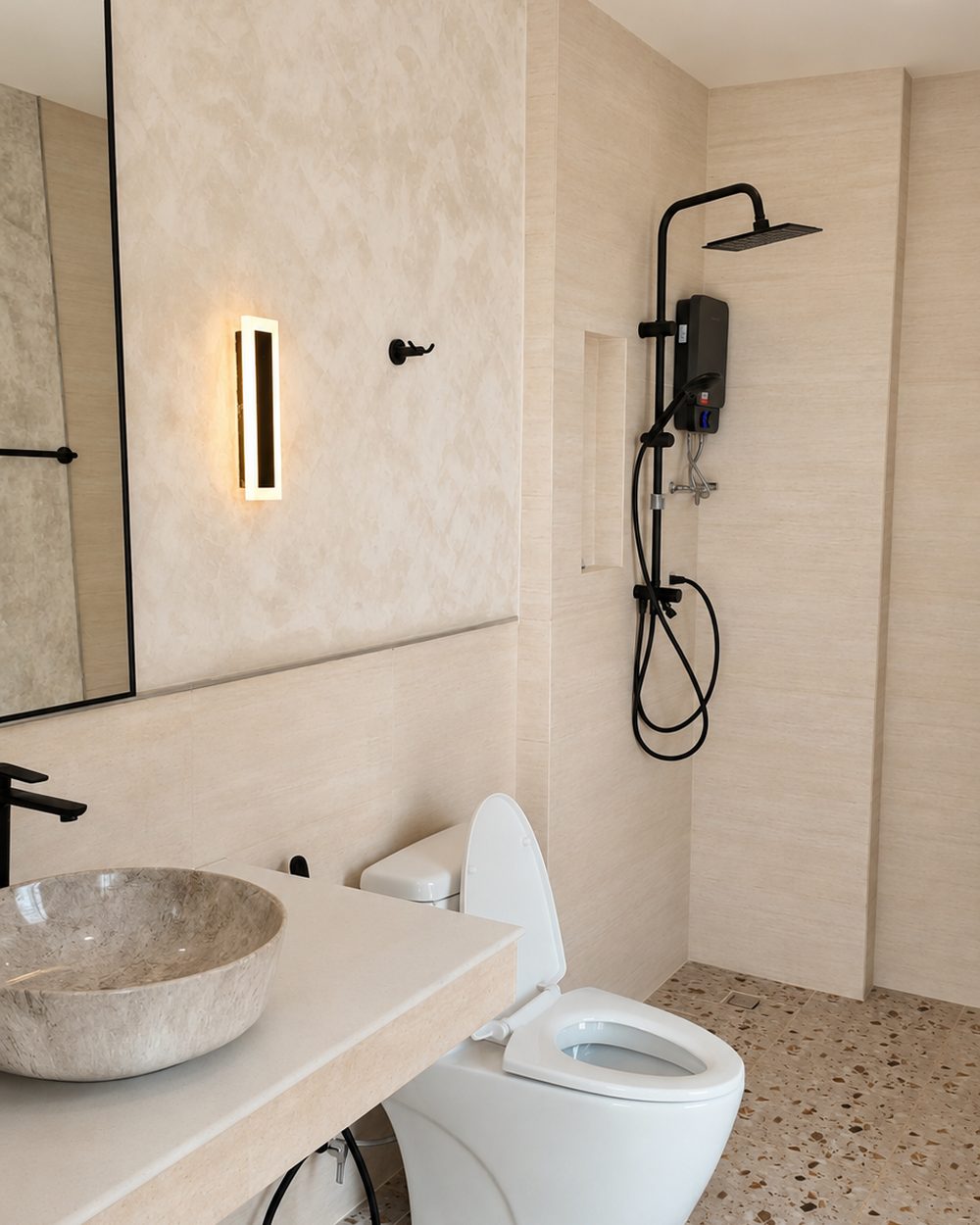 Bathroom with a natural stone vessel basin and rain shower
